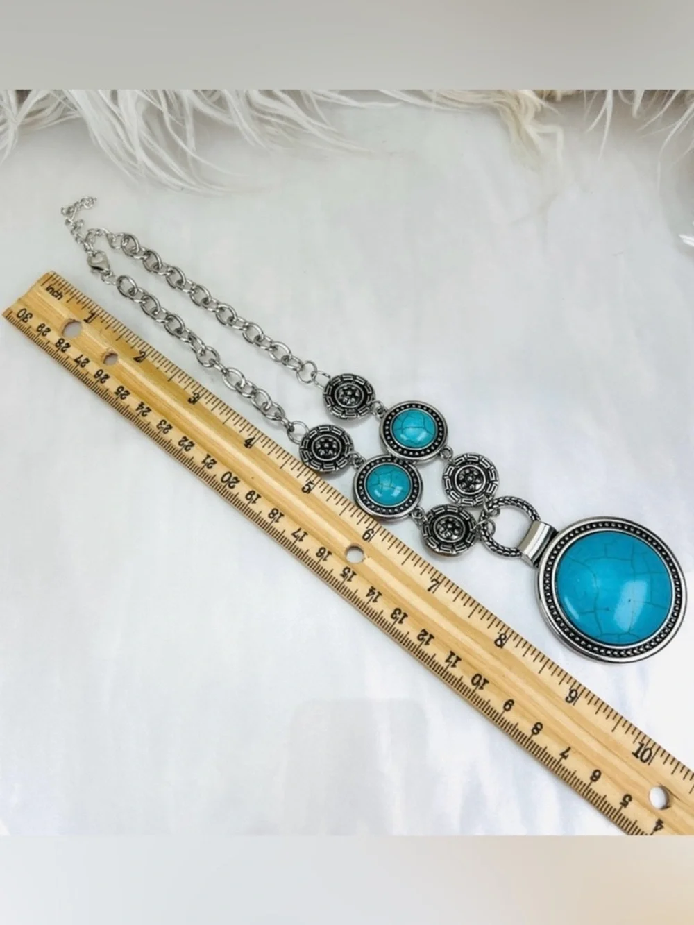 Silvertone, weighted southwestern style blue faux turquoise necklace